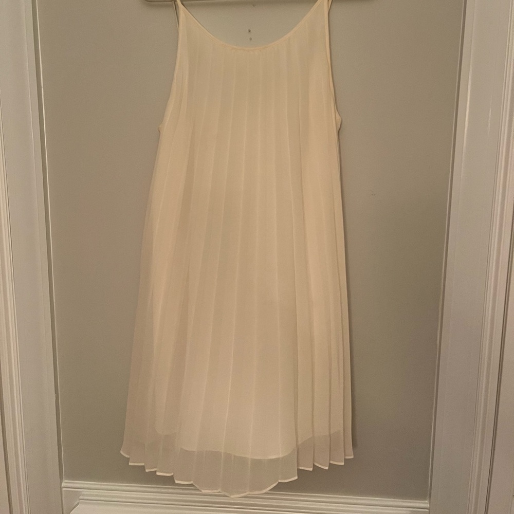 BCBGeneration pleated cream mini dress. Medium